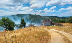 Kütahya'da köyde evde çıkan yangın ormana sıçradı