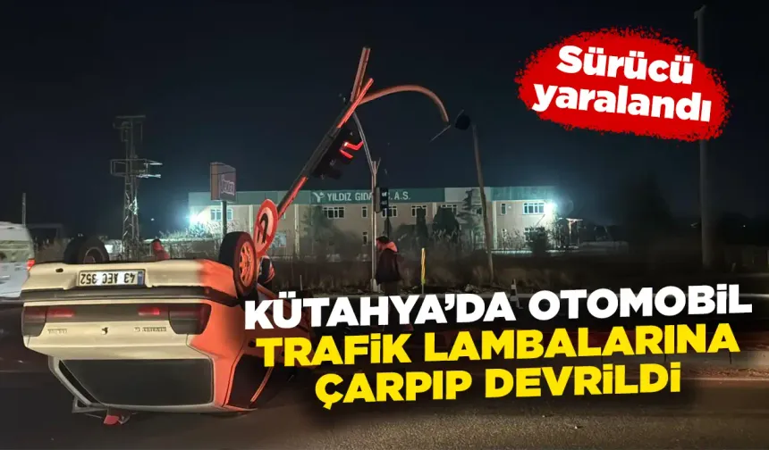 Kütahya’da otomobil trafik lambalarına çarpıp devrildi